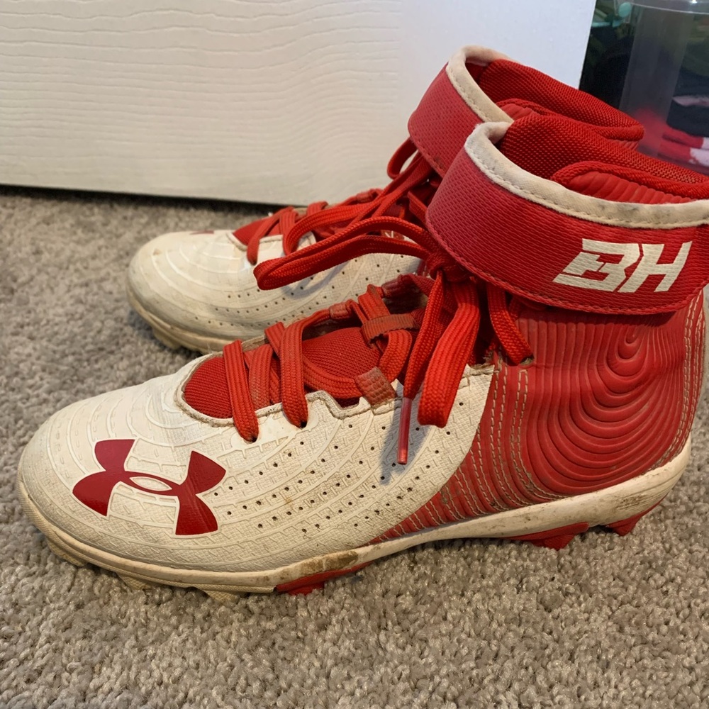 Under Armour baseball cleats, size 3.5, red and white
